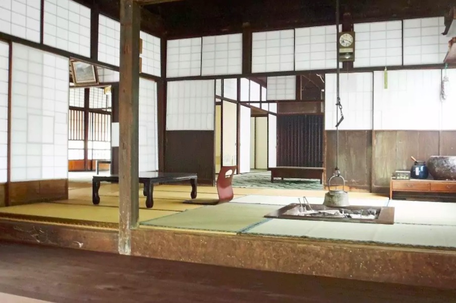 Dinner around the hearth at Farmstay Higashi